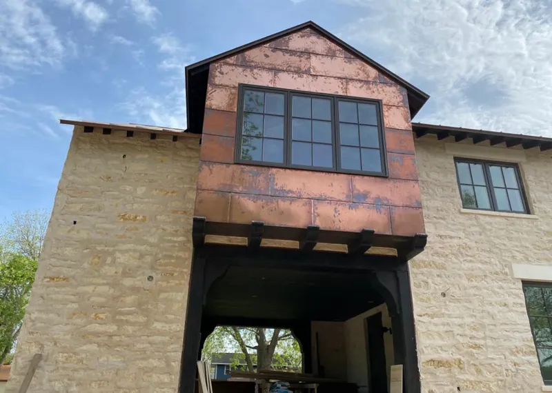 Copper metal panel facade on a stone building for Metal Roof Coating in Butte-Silver Bow